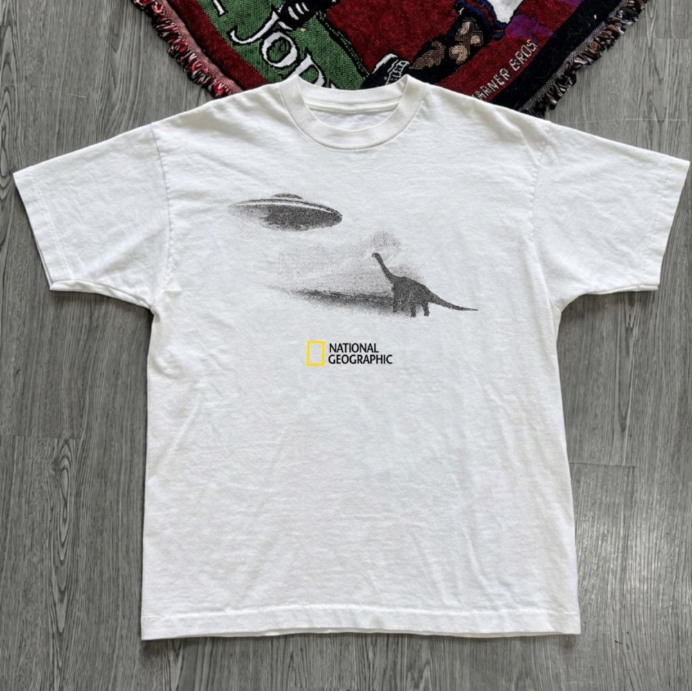 National Geographic Ufo Dinosaur Graphic Tee With Black Dinosaur And Ufo Graphic